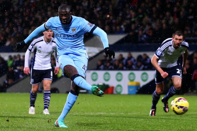 WEST BROMWICH, ENGLAND - DECEMBER 26:  Yaya Toure of Manchester City scores his team's second goal from the penalty spot during the Barclays Premier League match between West Bromwich Albion and Manchester City at The Hawthorns on December 26, 2014 in West Bromwich, England.  (Photo by Scott Heavey/Getty Images)