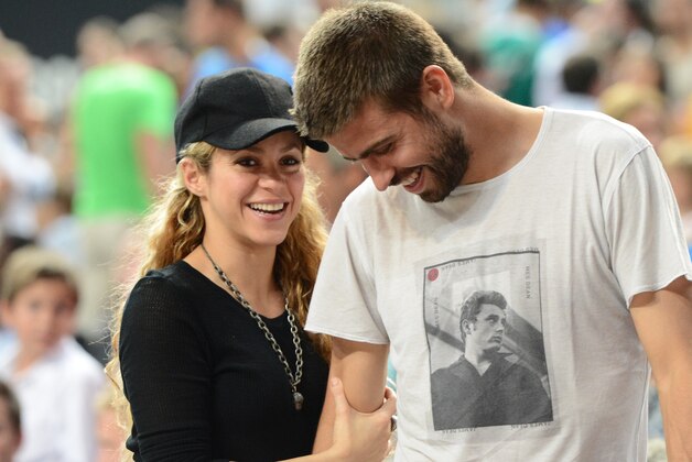 BARCELONA, SPAIN - SEPTEMBER 9: Pop Star Shakira and Gerard Pique of FC Barcelona takes in the game of the USA Basketball Men's National Team against the Slovenia National Team during the 2014 FIBA World Cup quarter-finals at Palau Sant Jordi on September 9, 2014 in Barcelona, Spain.  NOTE TO USER: User expressly acknowledges and agrees that, by downloading and/or using this Photograph, user is consenting to the terms and conditions of the Getty Images License Agreement. Mandatory Copyright Notice: Copyright 2014 NBAE (Photo by Garrett Ellwood/NBAE via Getty Images)