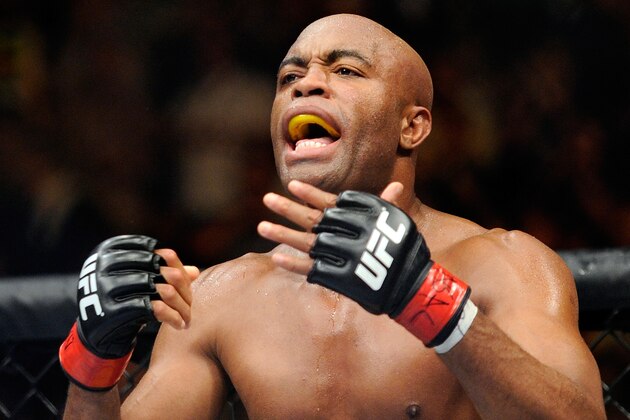 Anderson Silva taunts Chris Weidman between rounds during their UFC 162 mixed martial arts middleweight championship bout at the MGM Grand Garden Arena on Saturday, July 6, 2013, in Las Vegas. Weidman won the fight with a second round TKO. (AP Photo/David Becker)