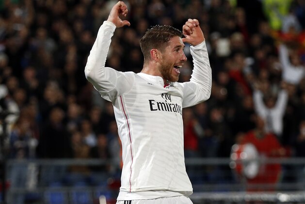 MARRAKECH, MOROCCO - DECEMBER 20: Sergio Ramos of Real Madrid CF celebrates scoring a goal during the FIFA Club World Cup Final match between Real Madrid CF and San Lorenzo at Le Grand Stade de Marrakech on December 20, 2014 in Marrakech, Morocco.  (Photo by Steve Bardens/Getty Images)