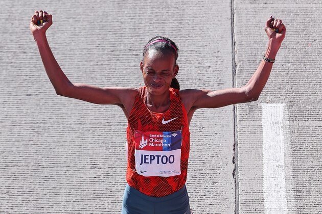 CHICAGO, IL - OCTOBER 12: Rita Jeptoo of Kenya celebrates after winning of the 2014 Bank of America Chicago Marathon on October 12, 2014 in Chicago, Illinois. (Photo by Jonathan Daniel/Getty Images) CHICAGO, IL - OCTOBER 12: Rita Jeptoo of Kenya celebrates after winning of the 2014 Bank of America Chicago Marathon on October 12, 2014 in Chicago, Illinois. (Photo by Jonathan Daniel/Getty Images)