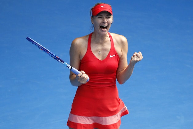 Maria Sharapova of Russia celebrates after defeating her compatriot Ekaterina Makarova in their semifinal match at the Australian Open tennis championship in Melbourne, Australia, Thursday, Jan. 29, 2015. (AP Photo/Vincent Thian)