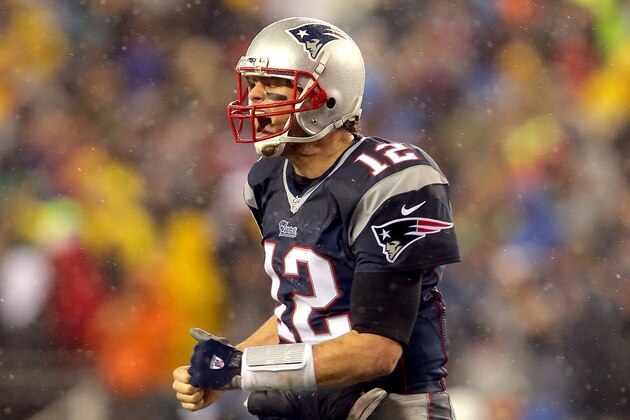 FOXBORO, MA - JANUARY 18:  Tom Brady #12 of the New England Patriots reacts against the Indianapolis Colts of the 2015 AFC Championship Game at Gillette Stadium on January 18, 2015 in Foxboro, Massachusetts.  (Photo by Elsa/Getty Images)