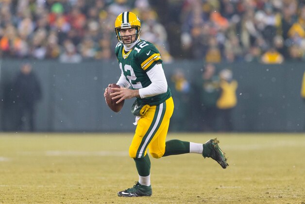 Dec 8, 2014; Green Bay, WI, USA; Green Bay Packers quarterback Aaron Rodgers (12) during the game against the Atlanta Falcons at Lambeau Field.  Green Bay won 43-37.  Mandatory Credit: Jeff Hanisch-USA TODAY Sports