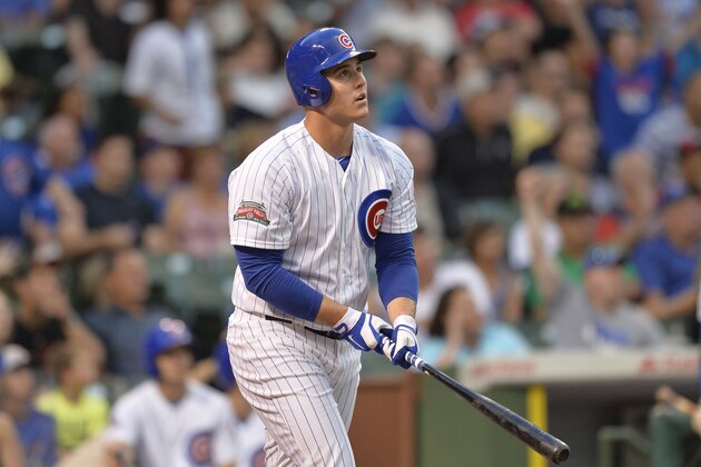 CHICAGO, IL - AUGUST 19:  Anthony Rizzo #44 of the Chicago Cubs watches his two-run home run leave the park, scoring teammate Javier Baez during the first inning against the San Francisco Giants at Wrigley Field on August 19, 2014 in Chicago, Illinois.  (Photo by Brian Kersey/Getty Images)