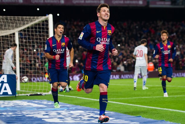 BARCELONA, SPAIN - JANUARY 21:  Lionel Messi of FC Barcelona celebrates after scoring his team's first goal during the Copa del Rey Quarter-Final First Leg match between FC Barcelona and Club Atletico de Madrid at Camp Nou on January 21, 2015 in Barcelona, Spain. (Photo by Alex Caparros/Getty Images)