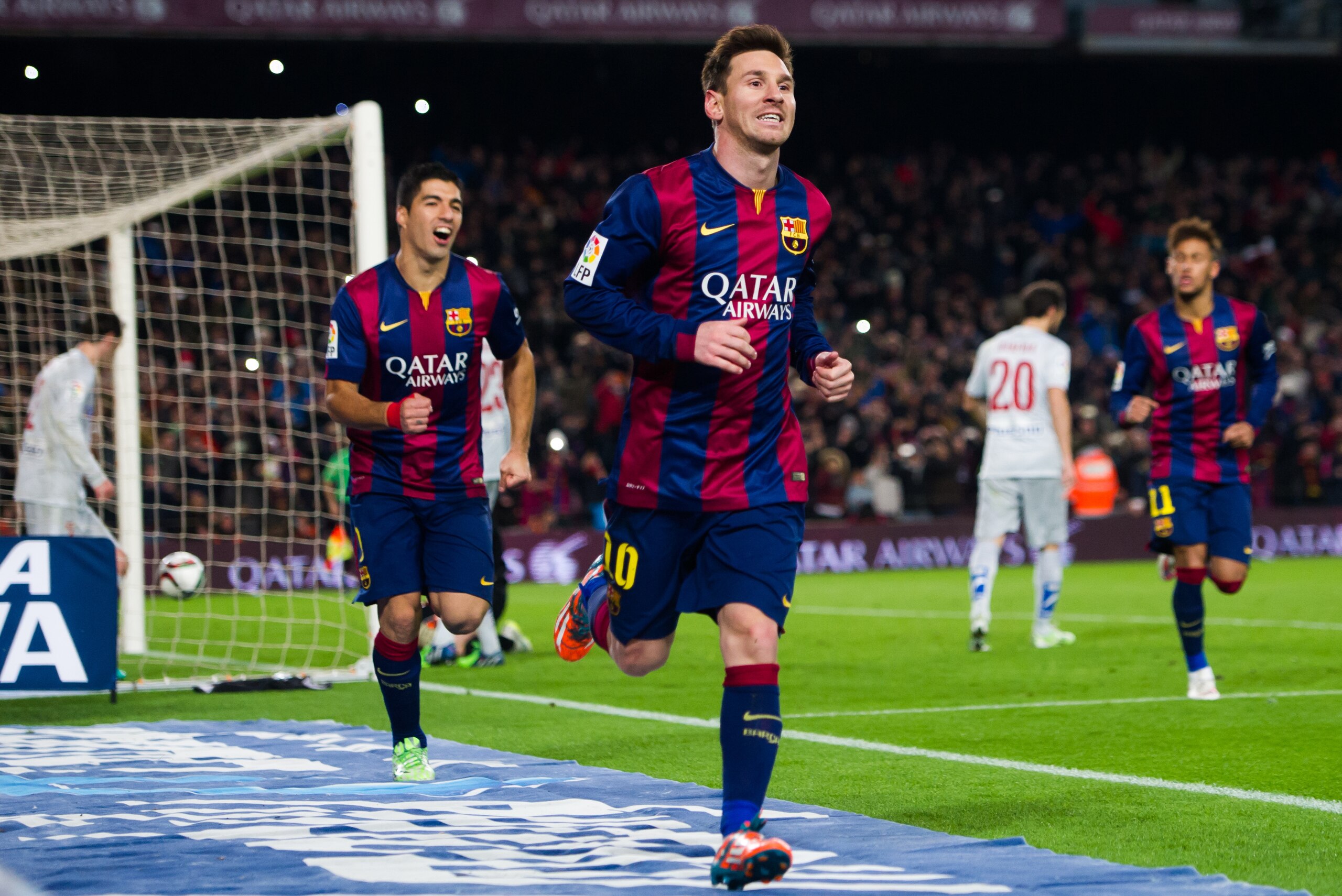 BARCELONA, SPAIN - JANUARY 21:  Lionel Messi of FC Barcelona celebrates after scoring his team's first goal during the Copa del Rey Quarter-Final First Leg match between FC Barcelona and Club Atletico de Madrid at Camp Nou on January 21, 2015 in Barcelona, Spain. (Photo by Alex Caparros/Getty Images)