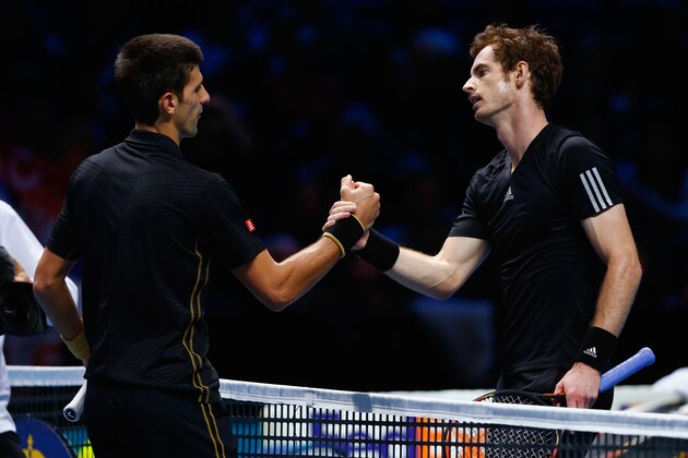 LONDON, ENGLAND - NOVEMBER 16:  Novak Djokovic of Serbia shakes hands with Andy Murray of Great Britain after the exhibition match on day eight of the Barclays ATP World Tour Finals at O2 Arena on November 16, 2014 in London, England. The Singles final was replaced with and exhibition match after Roger Federer of Switzerland pulled out with an injury.  (Photo by Julian Finney/Getty Images)