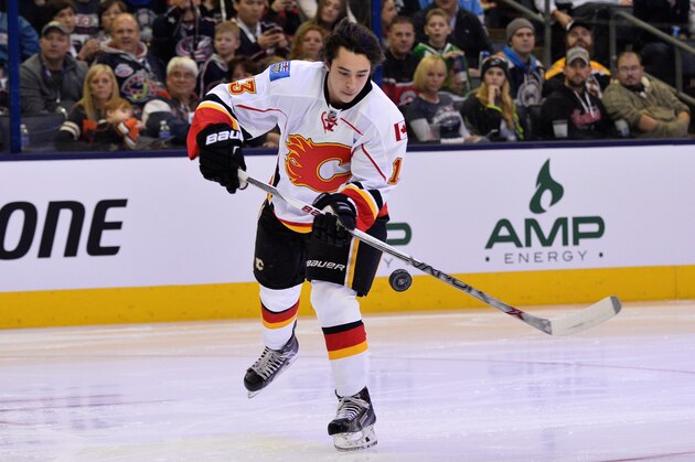 COLUMBUS, OH - JANUARY 24:  Johnny Gaudreau #13 of the Calgary Flames and Team Toews competes in the Honda NHL Breakaway Challenge event of the 2015 Honda NHL All-Star Skills Competition at Nationwide Arena on January 24, 2015 in Columbus, Ohio.  (Photo by Jamie Sabau/NHLI via Getty Images)