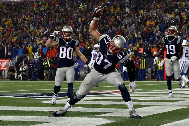 FOXBORO, MA - JANUARY 18:  Rob Gronkowski #87 of the New England Patriots spikes the ball after his third quarter touchdown against the Indianapolis Colts of the 2015 AFC Championship Game at Gillette Stadium on January 18, 2015 in Foxboro, Massachusetts.  (Photo by Elsa/Getty Images)