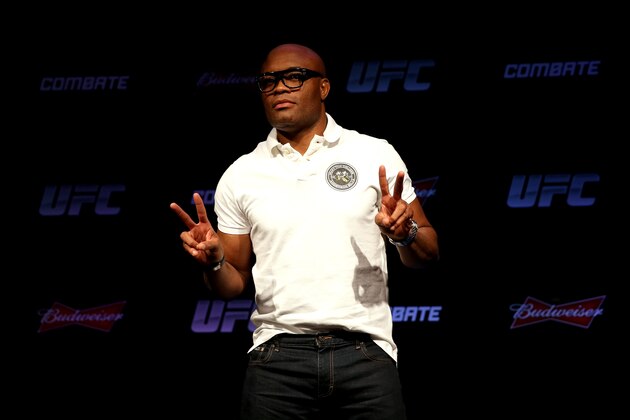 RIO DE JANEIRO, BRAZIL - OCTOBER 14:  Former UFC middleweight champion Anderson Silva poses for photographers after a press conference regarding his return to the Octoagon at the Copacabana Palace Hotel  on October 14, 2014 in Rio de Janeiro, Brazil.  (Photo by Matthew Stockman/Getty Images)