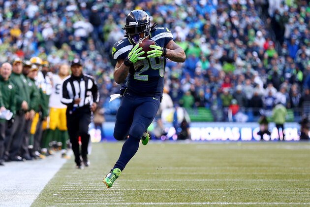 SEATTLE, WA - JANUARY 18:  Marshawn Lynch #24 of the Seattle Seahawks in action against the Green Bay Packers during the 2015 NFC Championship game at CenturyLink Field on January 18, 2015 in Seattle, Washington.  (Photo by Ronald Martinez/Getty Images)