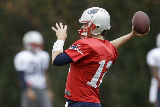 New England Patriots quarterback Tom Brady passes during practice Friday, Jan. 30, 2015, in Tempe, Ariz. The Patriots play the Seattle Seahawks in NFL football Super Bowl XLIX Sunday, Feb. 1. (AP Photo/Mark Humphrey)