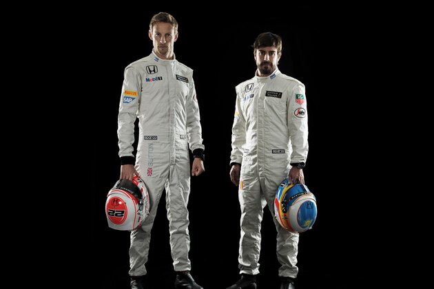 WOKING, ENGLAND - JANUARY 29: This handout image supplied by McLaren-Honda shows   McLaren-Honda drivers Jenson Button (l) and Fernando Alonso (r) during the launch of the car on January 29, 2015 in Woking, England.  (Photo by Handout/Getty Images)
