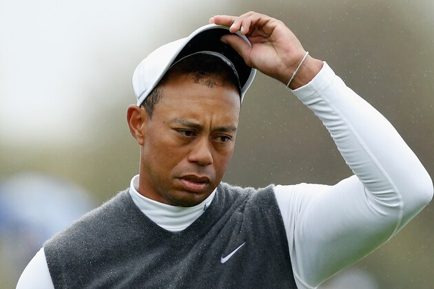 SCOTTSDALE, AZ - JANUARY 30:  Tiger Woods waits on the ninth green after marking his golf ball during the second round of the Waste Management Phoenix Open at TPC Scottsdale on January 30, 2015 in Scottsdale, Arizona.  (Photo by Scott Halleran/Getty Images)