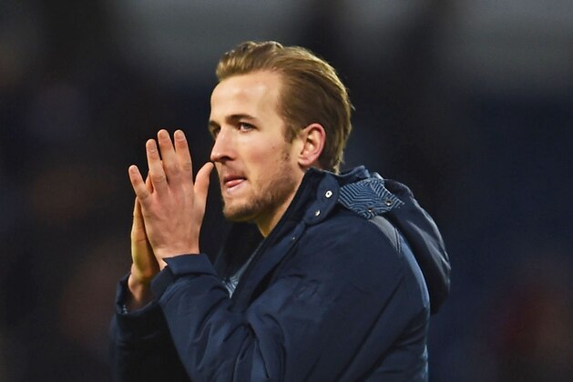 WEST BROMWICH, ENGLAND - JANUARY 31:  Harry Kane of Spurs applauds the fans following his team's 3-0 victory during the Barclays Premier League match between West Bromwich Albion and Tottenham Hotspur at The Hawthorns on January 31, 2015 in West Bromwich, England.  (Photo by Laurence Griffiths/Getty Images)