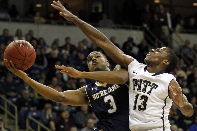 PITTSBURGH, PA - JANUARY 31:  V.J. Beachem #3 of the Notre Dame Fighting Irish drives to the basket against Josh Newkirk #13 of the Pittsburgh Panthers during the game at Petersen Events Center on January 31, 2014 in Pittsburgh, Pennsylvania.  (Photo by Justin K. Aller/Getty Images)