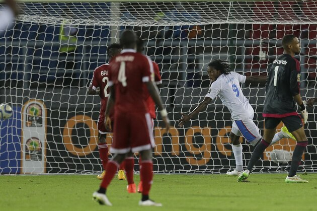 DR Congo's Diedonnei Mbokani, second from right, celebrates his goal during their African Cup of Nations quarter final soccer match against Congo in Bata, Equatorial Guinea, Saturday, Jan. 31, 2015. (AP Photo/Themba Hadebe)
