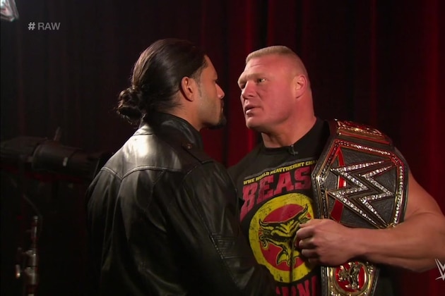 Paul Heyman, left, celebrates with Brock Lesnar after his win over the Undertaker  during Wrestlemania XXX at the Mercedes-Benz Super Dome in New Orleans on Sunday, April 6, 2014. (Jonathan Bachman/AP Images for WWE)
