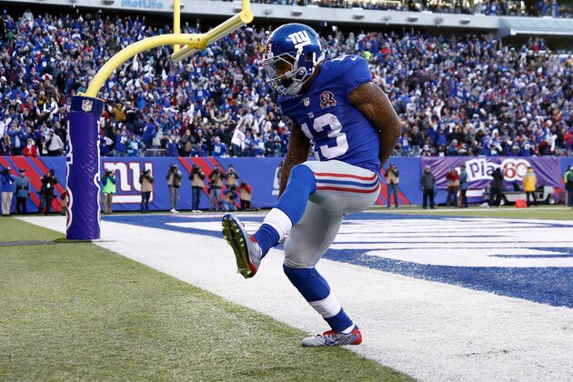 EAST RUTHERFORD, NJ - DECEMBER 14:  Odell Beckham Jr. #13 of the New York Giants celebrates after scoring a 35 yard touchdown in the third quarter against the Washington Redskins during their game at MetLife Stadium on December 14, 2014 in East Rutherford, New Jersey.  (Photo by Jeff Zelevansky/Getty Images)