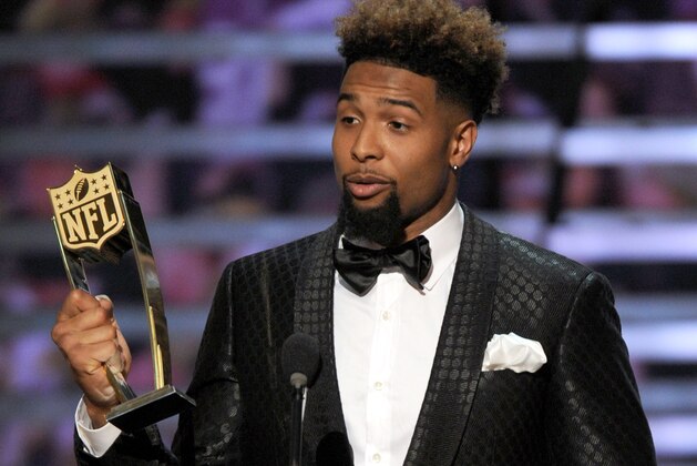 Odell Beckham Jr., of the New York Giants, accepts the AP offensive rookie of the year award on stage at the 4th annual NFL Honors at the Phoenix Convention Center Symphony Hall on Saturday, Jan. 1, 2015. (Photo by Frank Micelotta/Invision for NFL/AP Images)