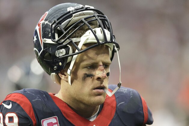 Houston Texans' J.J. Watt looks pensive on the sidelines during the second quarter of an NFL football game against the St. Louis Rams Sunday, Oct. 13, 2013, in Houston, Texas. (AP Photo/Eric Gay)