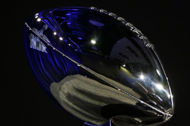 The Lombardi Trophy at a news conference for NFL Super Bowl XLIX football game Friday, Jan. 30, 2015, in Phoenix. (AP Photo/Matt Slocum)
