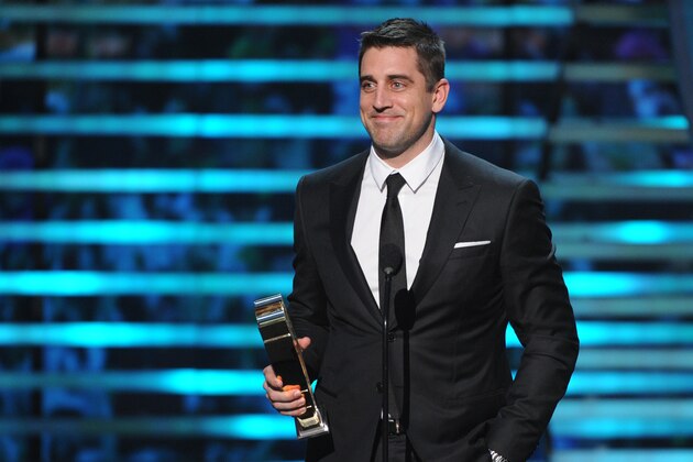 Aaron Rodgers, of the Green Bay Packers, accepts the AP most valuable player of the year at the 4th annual NFL Honors at the Phoenix Convention Center Symphony Hall on Saturday, Jan. 1, 2015. (Photo by Frank Micelotta/Invision for NFL/AP Images)