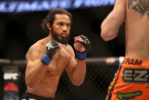 Benson Henderson in action against Donald Cerrone during their lightweight fight at UFC Fight Night Boston, Sunday, January 18, 2015 in Boston.  Cerrone won via unanimous decision. (AP Photo/Gregory Payan)