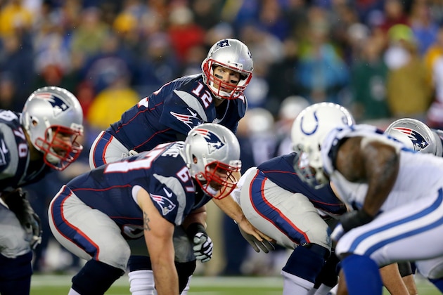 FOXBORO, MA - JANUARY 18:  Tom Brady #12 of the New England Patriots calls a play in the first quarter against the Indianapolis Colts of the 2015 AFC Championship Game at Gillette Stadium on January 18, 2015 in Foxboro, Massachusetts.  (Photo by Maddie Meyer/Getty Images)