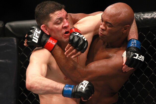 LAS VEGAS, NV - JANUARY 31:  Nick Diaz and Anderson Silva fight in their middleweight bout during UFC 183 at the MGM Grand Garden Arena on January 31, 2015 in Las Vegas, Nevada. Silva won by unanimous decision.  (Photo by Steve Marcus/Getty Images)