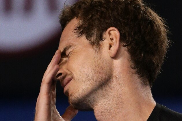 Andy Murray of Britain reacts to a lost point to Novak Djokovic of Serbia during the men's singles final at the Australian Open tennis championship in Melbourne, Australia, Sunday, Feb. 1, 2015. (AP Photo/Rob Griffith)