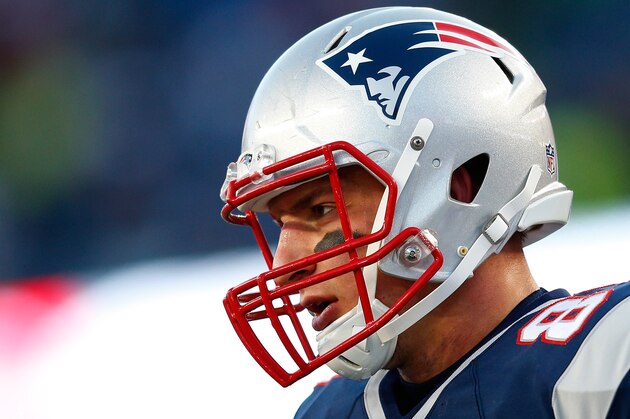 FOXBORO, MA - JANUARY 10:  Rob Gronkowski #87 of the New England Patriots warms up before the 2014 AFC Divisional Playoffs game against the Baltimore Ravens at Gillette Stadium on January 10, 2015 in Foxboro, Massachusetts.  (Photo by Jim Rogash/Getty Images)