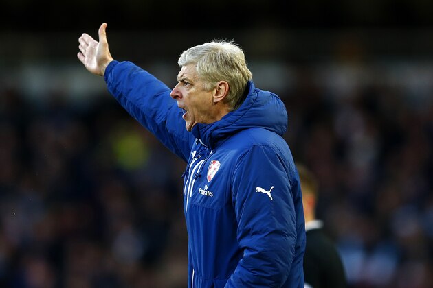 LONDON, ENGLAND - DECEMBER 28:  Arsene Wenger, manager of Arsenal reacts during the Barclays Premier League match between West Ham United and Arsenal at Boleyn Ground on December 28, 2014 in London, England.  (Photo by Julian Finney/Getty Images)