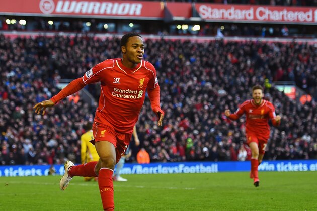 LIVERPOOL, ENGLAND - JANUARY 31:  Raheem Sterling of Liverpool celebrates scoring the opening goal during the Barclays Premier League match between Liverpool and West Ham United at Anfield on January 31, 2015 in Liverpool, England.  (Photo by Shaun Botterill/Getty Images)