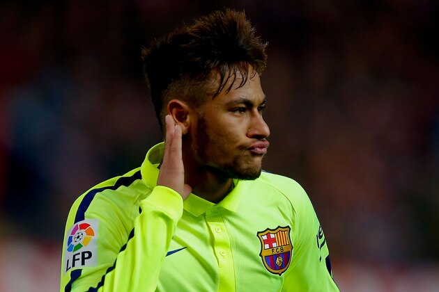 MADRID, SPAIN - JANUARY 28:  Neymar JR. of FC Barcelona celebrates scoring their third goal during the Copa del Rey Round of 8 second leg match between Club Atletico de Madrid and FC Barcelona at Vicente Calderon Stadium on January 28, 2015 in Madrid, Spain.  (Photo by Gonzalo Arroyo Moreno/Getty Images)