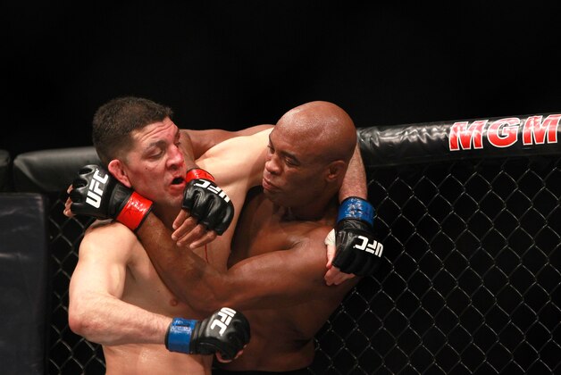 LAS VEGAS, NV - JANUARY 31:  Nick Diaz and Anderson Silva fight in their middleweight bout during UFC 183 at the MGM Grand Garden Arena on January 31, 2015 in Las Vegas, Nevada. Silva won by unanimous decision.  (Photo by Steve Marcus/Getty Images)