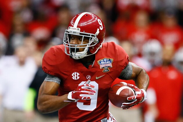NEW ORLEANS, LA - JANUARY 01:  Amari Cooper #9 of the Alabama Crimson Tide runs the ball in the first quarter against the Ohio State Buckeyes during the All State Sugar Bowl at the Mercedes-Benz Superdome on January 1, 2015 in New Orleans, Louisiana.  (Photo by Kevin C. Cox/Getty Images)