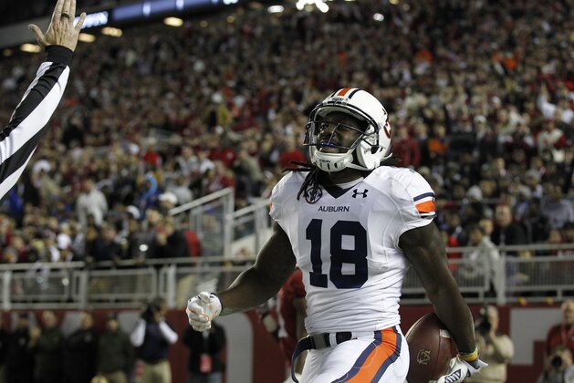 Auburn wide receiver Sammie Coates (18) celebrates his touchdown against Alabama during the first half of the Iron Bowl NCAA college football game, Saturday, Nov. 29, 2014, in Tuscaloosa, Ala. (AP Photo/Butch Dill)