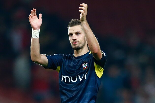 LONDON, ENGLAND - SEPTEMBER 23:  Morgan Schneiderlin of Southampton thanks the support at full time during the Capital One Cup Third Round match between Arsenal and Southampton at the Emirates Stadium on September 23, 2014 in London, England.  (Photo by Julian Finney/Getty Images)