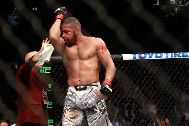 LAS VEGAS, NV - JANUARY 31:  Thales Leites kisses his bicep after defeating Tim Boetsch in a middleweight bout during UFC 183 at the MGM Grand Garden Arena on January 31, 2015 in Las Vegas, Nevada. Leites won by submission in the second round.  (Photo by Steve Marcus/Getty Images)