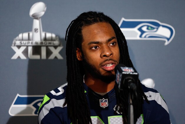 CHANDLER, AZ - JANUARY 28:  Cornerback Richard Sherman #25 of the Seattle Seahawks speaks during a Super Bowl XLIX media availability at the Arizona Grand Hotel on January 28, 2015 in Chandler, Arizona.  (Photo by Christian Petersen/Getty Images)