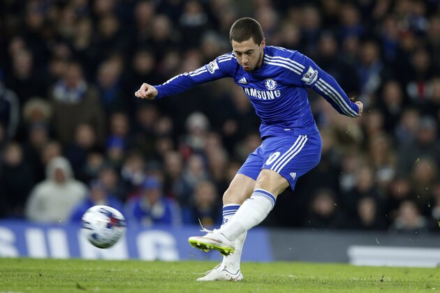 Chelsea's Eden Hazard shoots toward the goal but fails to score during the English League Cup semifinal second leg soccer match between Chelsea and Liverpool at Stamford Bridge stadium in London, Tuesday, Jan. 27, 2015. (AP Photo/Alastair Grant)