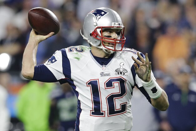 New England Patriots quarterback Tom Brady (12) throws a pass during the second half of NFL Super Bowl XLIX football game against the Seattle Seahawks Sunday, Feb. 1, 2015, in Glendale, Ariz. (AP Photo/Patrick Semansky)