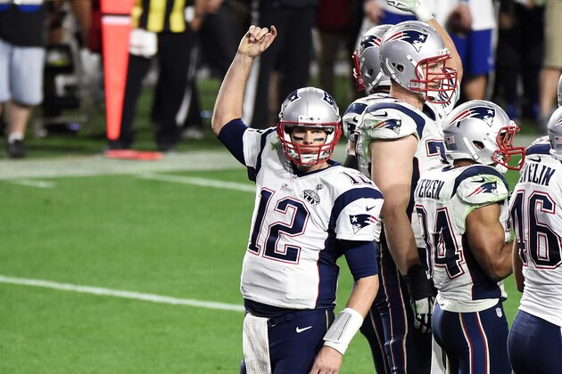 GLENDALE, AZ - FEBRUARY 01: Tom Brady #12 of the New England Patriots celebrates in the final seconds against the Seattle Seahawks in the fourth quarter during Super Bowl XLIX at University of Phoenix Stadium on February 1, 2015 in Glendale, Arizona.  (Photo by Harry How/Getty Images)