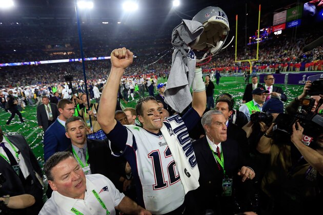 GLENDALE, AZ - FEBRUARY 01:  Tom Brady #12 of the New England Patriots celebrates after defeating the Seattle Seahawks during Super Bowl XLIX at University of Phoenix Stadium on February 1, 2015 in Glendale, Arizona. The Patriots defeated the Seahawks 28-24. (Photo by Rob Carr/Getty Images)