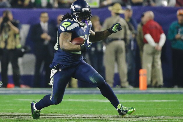 Seattle Seahawks running back Marshawn Lynch (24) rushes during the second half of NFL Super Bowl XLIX football game against the New England Patriots Sunday, Feb. 1, 2015, in Glendale, Ariz. (AP Photo/Mark Humphrey)