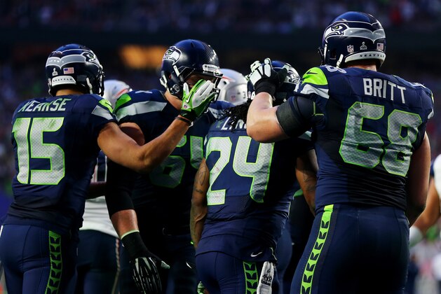 GLENDALE, AZ - FEBRUARY 01:  Marshawn Lynch #24 of the Seattle Seahawks celebrates after scoring a touchdown against the New England Patriots in the second quarter during Super Bowl XLIX at University of Phoenix Stadium on February 1, 2015 in Glendale, Arizona.  (Photo by Elsa/Getty Images)