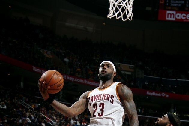 CLEVELAND, OH - JANUARY 30: LeBron James #23 of the Cleveland Cavaliers shoots against the Sacramento Kings at The Quicken Loans Arena on January 30, 2015 in Cleveland, Ohio. NOTE TO USER: User expressly acknowledges and agrees that, by downloading and/or using this Photograph, user is consenting to the terms and conditions of the Getty Images License Agreement. Mandatory Copyright Notice: Copyright 2015 NBAE (Photo by Gregory Shamus/NBAE via Getty Images)