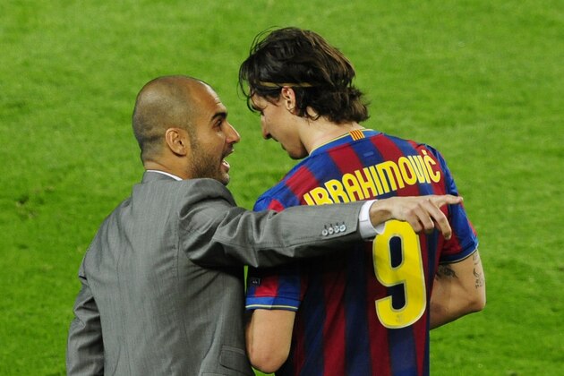 FC Barcelona's Zlatan Ibrahimovic of Sweden, right talks with his coach Pep Guardiola, during the Champions League semifinal second leg soccer match between FC Barcelona and Inter Milan at the Camp Nou stadium in Barcelona, Spain, Wednesday, April 28, 2010. Inter lost the match 0-1, but went through to the final 3-2 on aggregate. (AP Photo/Manu Fernandez)